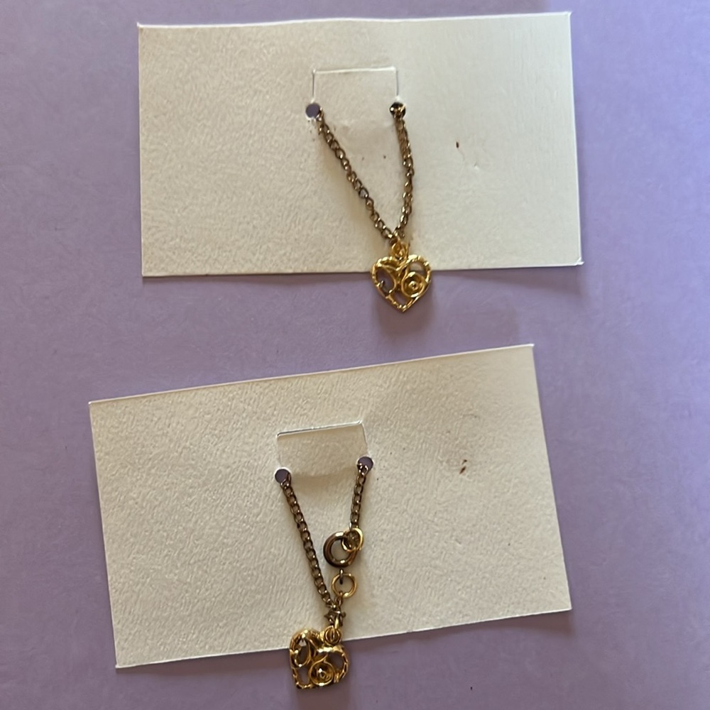 2 Marie Osmond doll bracelets.